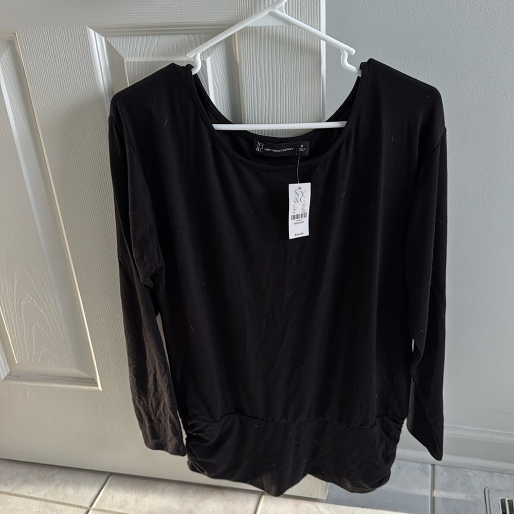 New York and Company size medium black long sleeve top with elastic at bottom